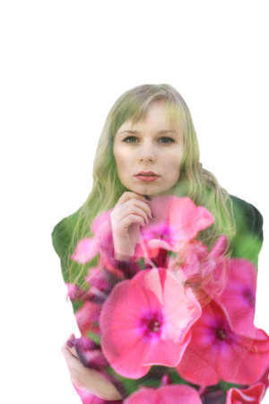 Double exposure portrait of young woman and blooming flowersの写真素材
