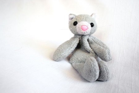 stuffed toy cat sittingの写真素材