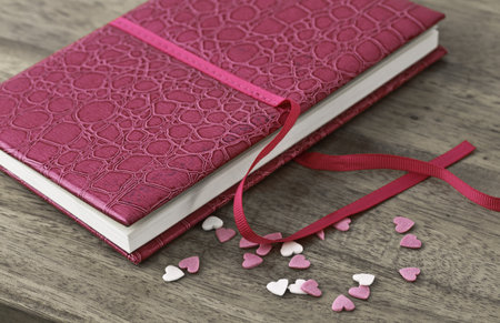 Leather organizer / diary on wooden table