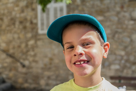 boy in a ball capの写真素材