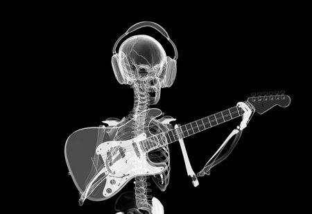 xray Skeleton in headphones playing guitar の写真素材