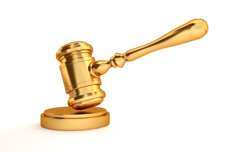 golden judges gavel isolated on white backgroundの写真素材