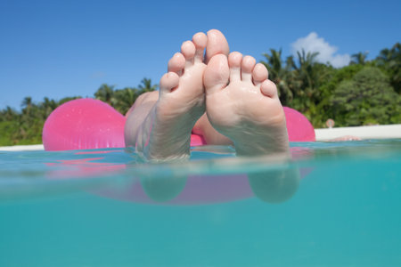 Relaxing on a floating tireの写真素材