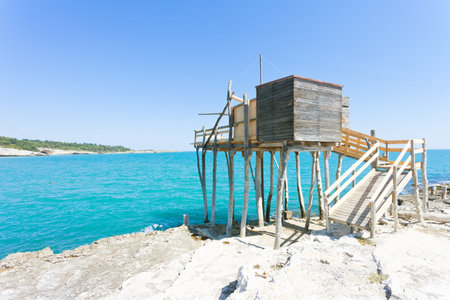 Vieste, Apulia, Italy - Fishing trabocco at the rocky beach of Viesteの写真素材