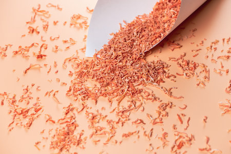 Dried carrots in paper bag for cooking. Vegetable drying in dehydrator. Healthy and healthy food.