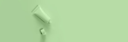 Layout of an empty tube for cream or gel. Womens cosmetics and hygiene. Banner.の写真素材