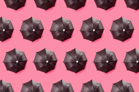 Open umbrella for shelter from the rain. Spring and autumn weather. Protection and shelter from bad weather and snow. Patternの写真素材