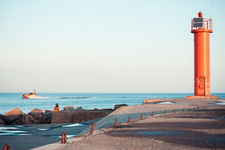 Red beacon on Baltic seaの写真素材