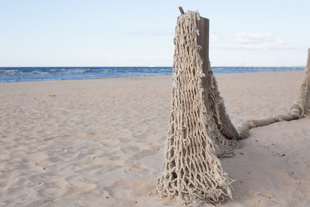 Landscape with fishing net on Baltic seaの写真素材