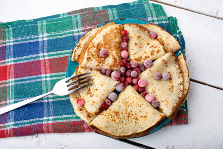 Russian Fried pancakes on old wooden table. Top view. Flat lay. Star shapeの写真素材