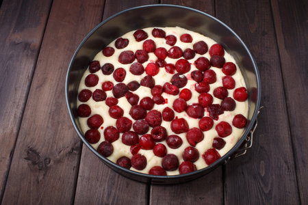 Homemade cherry pie on rustic background