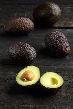 avocado on a dark wooden background