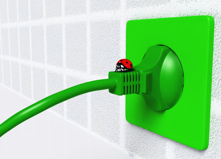 a small ladybug is on an ecological green plug that is connected to a green socket placed on the...