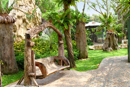 Wooden bench in the Million Years Stone Park. Pattaya. Thailand の写真素材