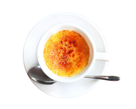 Creme Brulee in a coffee cup isolated on white backgroundの写真素材