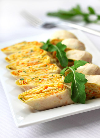 Rolls of Armenian lavash with onions, carrots and cheeseの写真素材