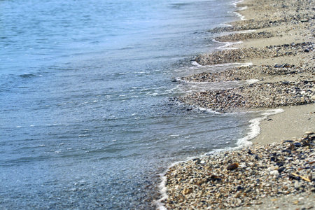 Sea surf and sand coast. 