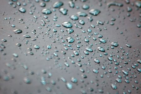 Drops of water / background/  Drops of water on a waterproof protective fabricの写真素材