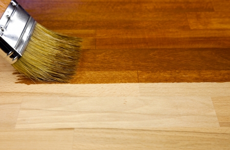 Wood texture and paintbrush / housework backgroundの写真素材