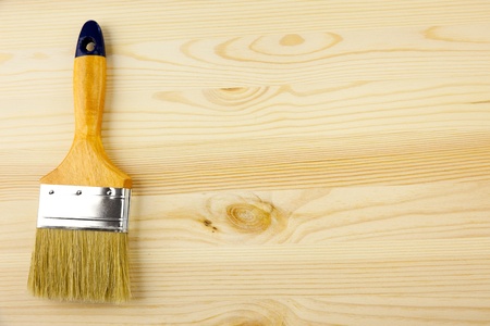Wood texture and paintbrush / covering by varnish