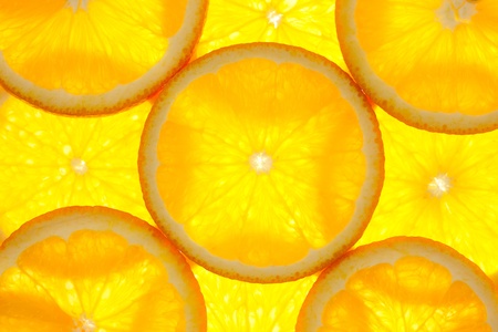 Orange slices background / macro / back litの写真素材