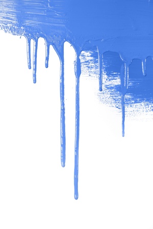 Blue paint  flows / isolated on white background with copy space / real photoの写真素材