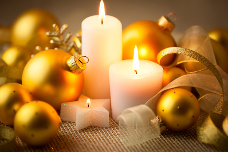 Christmas candles background with baubles and ribbons - horizontal cardの写真素材