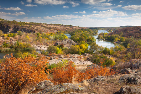 Beautiful Sunny Autumn Day  - Panoramic view on the river, colorful trees  and big rocks - wallpaperの写真素材