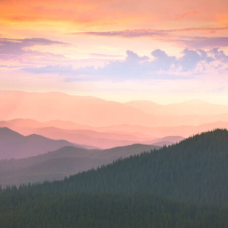 Beautiful Mountains -  sunset time. Hight peaks, clouds and colorful sunset. Carpathians, Ukraineの写真素材