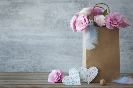 Romantic background with roses and handmade hearts - copy spaceの写真素材