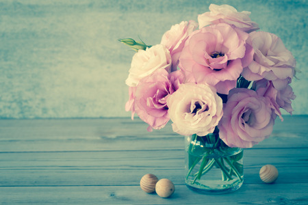 Gentle Flowers in a glass vase with copy space - vintage style still life, tonedの写真素材