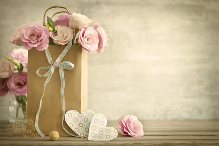 Wedding background with pink roses bow and paper Hearts vintage style