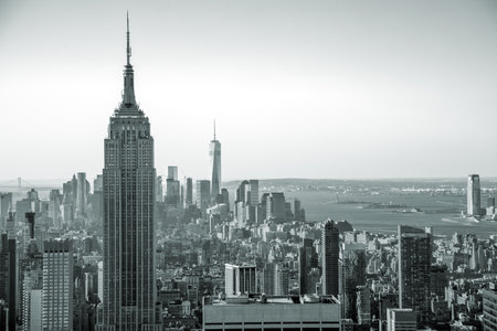 Aerial view of Manhattan skyline at sunrise, New York City, USA. Black and white style image