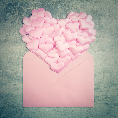 Love background - gentle pink  hearts and envelope, valentines day,  Retro vintage toned 