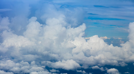 Panoramic view of  dramatic clouds and sky atmosphere viewed from the plane