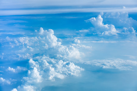 Aerial view of  light clouds and sky atmosphere viewed from the plane, sky backgroundの写真素材