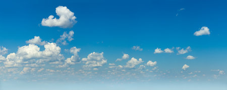 Blue sky and white light clouds natural panorama, big sizeの写真素材