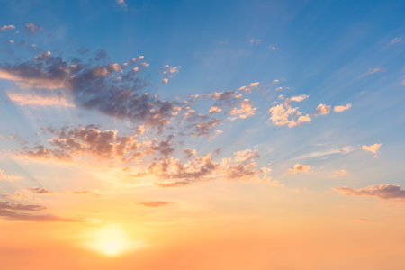 Gentle Sky at Sunset or Sunrise time with real sun and clouds, natural colors, big size panoramic backgroundの写真素材