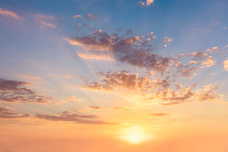 Gentle Real Sky at Sunset or Sunrise time with real sun and clouds, natural colors, big size panoramic backgroundの写真素材