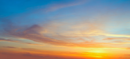 Real panoramic sunrise sundown sky with gentle colorful clouds. Big sizeの写真素材