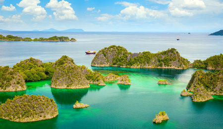 Paradise place - picturesque lagoon with islands and turquoise calm water, Raja Ampat, Papua, Indonesia. Panoramic view, big sizeの写真素材