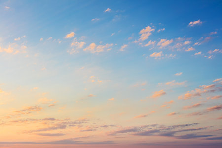 Gentle Natural Sunset Sunrise sky with light clouds and pastel colorsの写真素材