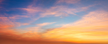 Real amazing panoramic sunrise sundown sunset sky with gentle colorful clouds. Long panorama, crop itの写真素材