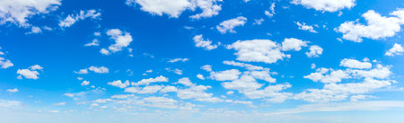 Panorama of Blue sky with light white clouds is a good day mood. Natural sky background. Panoramic backgroundの写真素材