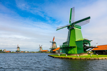 Zaanse Schans is a famous Dutch village with windmills, Agricultural historical landscape. Tourism. Popular Holland, Netherlands, Europe.のeditorial素材