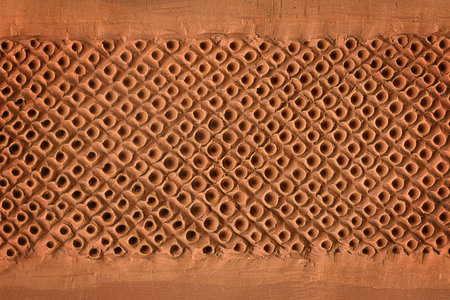 Dotted clay texture, pottery backgroundの写真素材