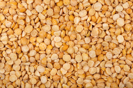 Split dried yellow peas background 