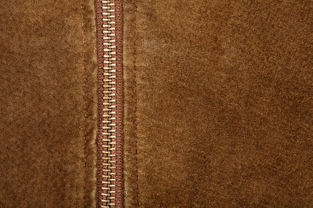 Brown suede texture and zipper background  の写真素材