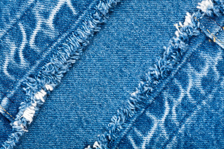 Worn blue denim jeans texture  