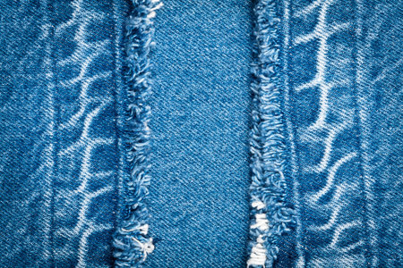 Worn blue denim jeans texture   
